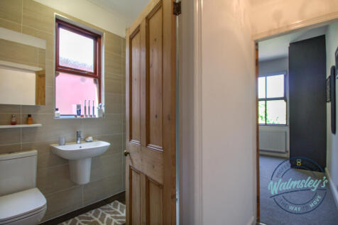 Main bathroom and rear bedroom beyond