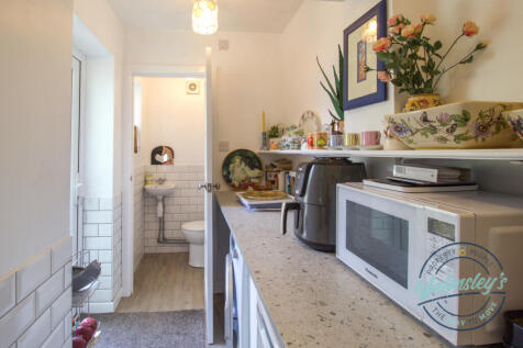 Utility with door to gardens