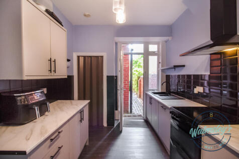 Kitchen with patio door garden