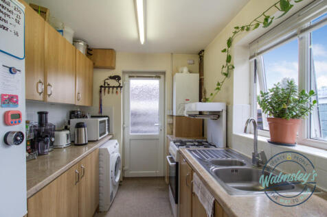 Kitchen with door to driveway