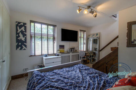 Double bedroom to front with stairs to loft room_