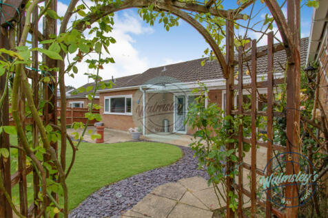 Rear elevation through rose arch