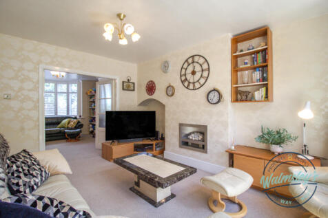 Sitting room through to front reception