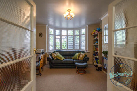 French doors to front sitting room