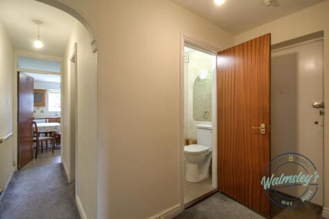 Hallway with cloakroom inc wash basin