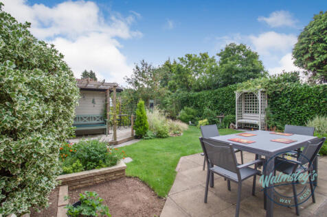 Patio, summer house and gardens_