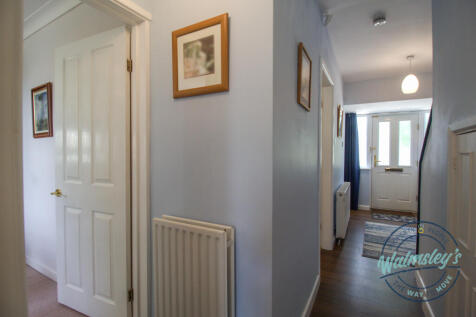 Entrance hallway from kitchen