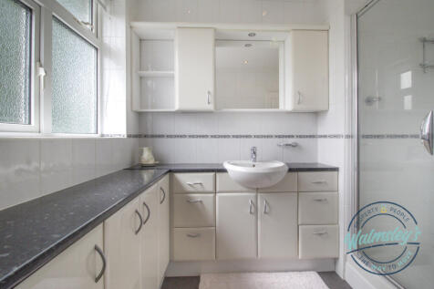 Shower room with fitted storage