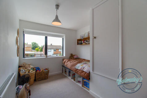 Bedroom three with fitted wardrobes