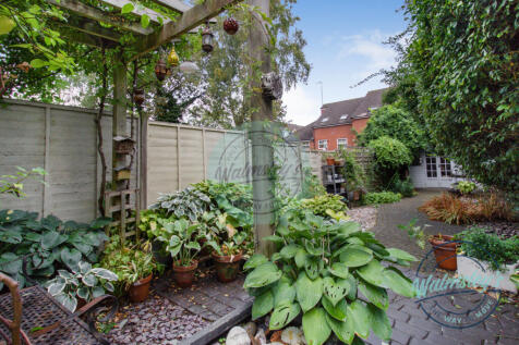 Patio &amp; gardens with summer house