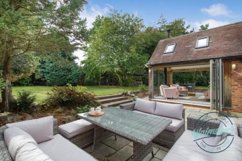 Patio areas and oak framed garden room