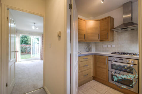 Kitchen with sitting dining room beyond