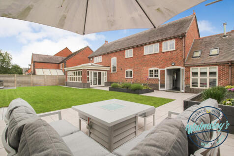 Rear elevation and patios