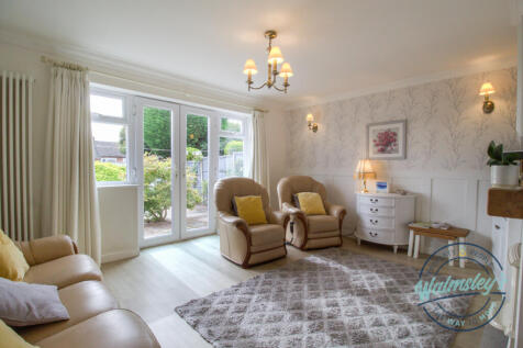 Sitting room with French doors to gardens