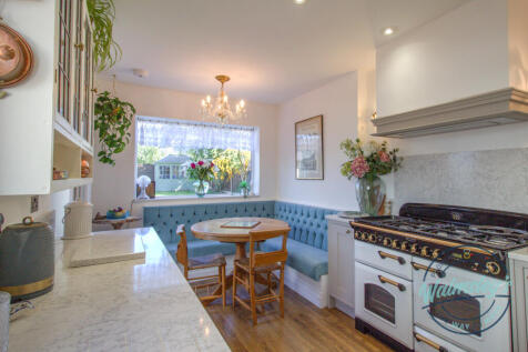 Kitchen breakfast with granite worksurfaces &amp; gard