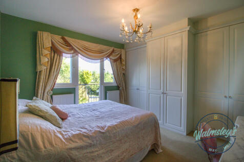 Main bedroom with balcony