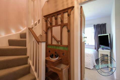 Stairs to loft bedroom with bedroom three beyond