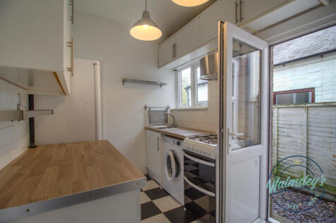 Kitchen with door to gardens