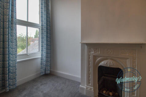 Fireplace to rear bedroom