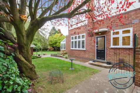 Side entrance & gardens