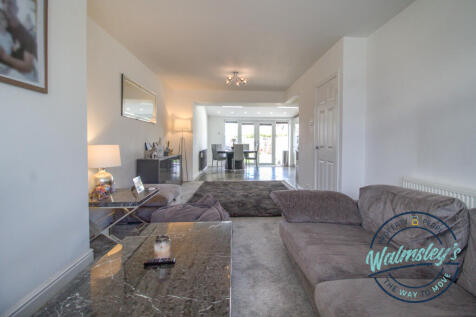 Sitting area with kitchen extension beyond