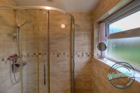 1st floor fully tiled shower room