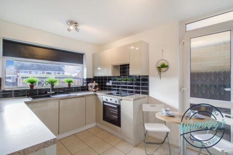 Kitchen breakfast with door to side_