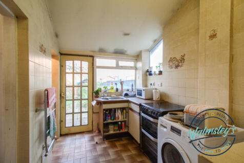 Kitchen to rear of house