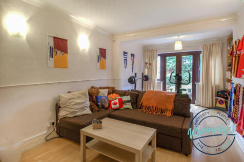 Extended sitting room with French doors to garden