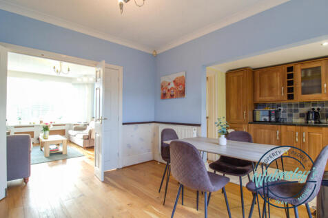 Dining room with opening doors to sitting room