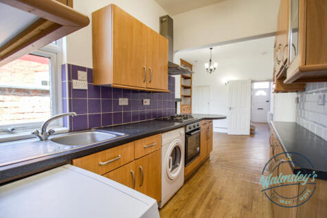 Kitchen open plan to rear reception room