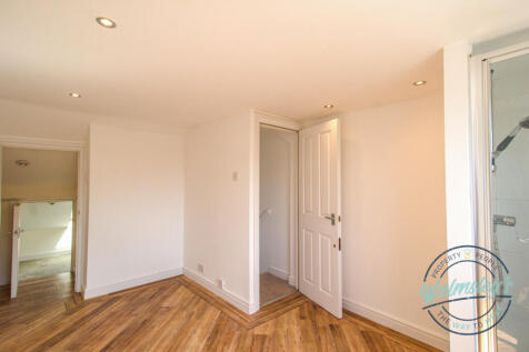 Loft room with shower cubicle and excellent storag