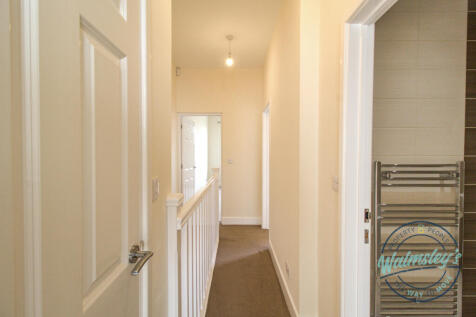 Landing with storage cupboard