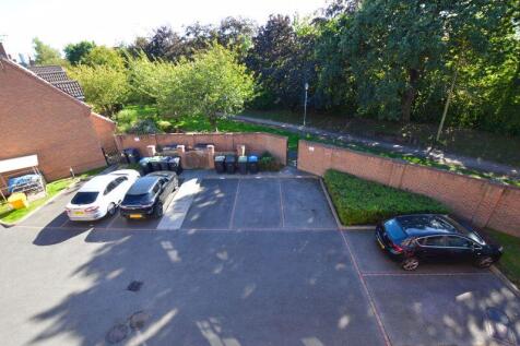 PARKING AREA FROM THE BALCONY