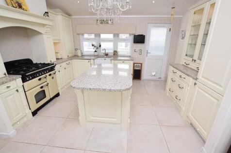 open plan kitchen &amp; dining room
