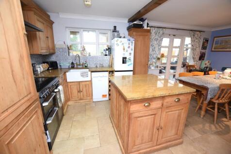 open plan kitchen &amp; dining room