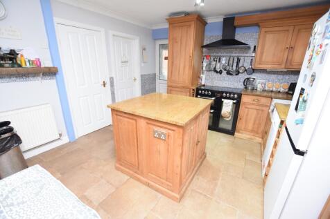 open plan kitchen &amp; dining room