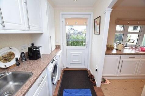 utility room through to the kitchen