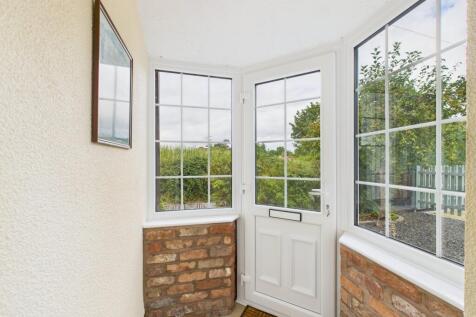 enclosed front porch
