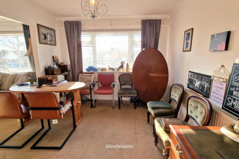 FRONT BEDROOM - DINING ROOM