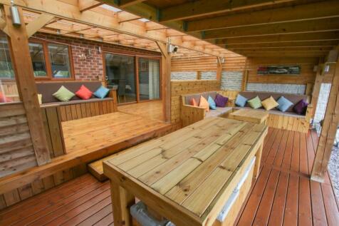 WOODED DECKED GARDEN AREA
