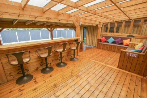 WOODED DECKED GARDEN AREA