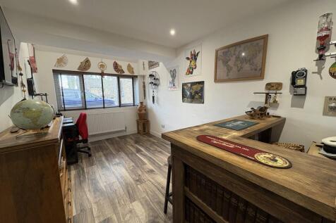OFFICE/FAMILY ROOM/BEDROOM/BAR AREA