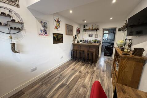 OFFICE/FAMILY ROOM/BEDROOM/BAR AREA