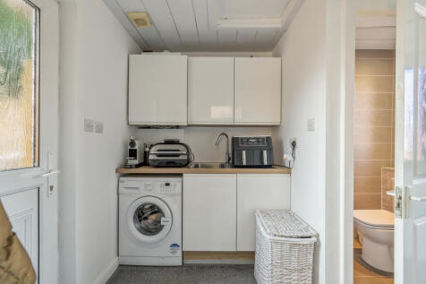 Utility Room/ Downstairs W.C