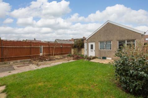 Garden looking to garage