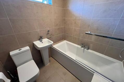 Bathroom with shower over