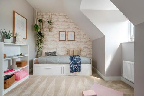 Guest bedroom, studio or playroom? Bedroom four on the top floor suits everyone