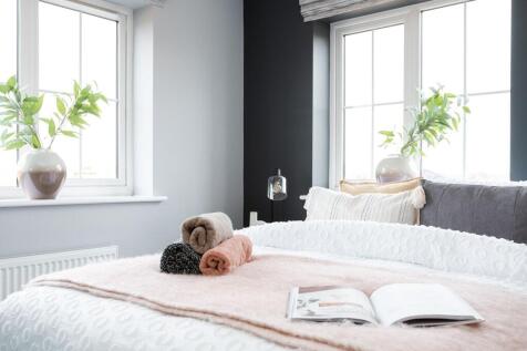 Bedroom 2 is flooded with natural light