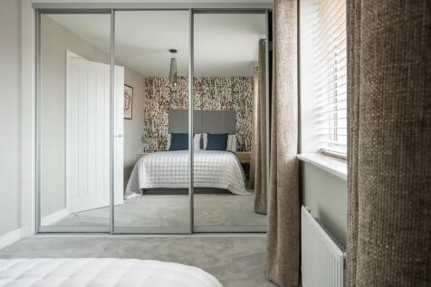 The second double bedroom has space for fitted wardrobes and overlooks the garden